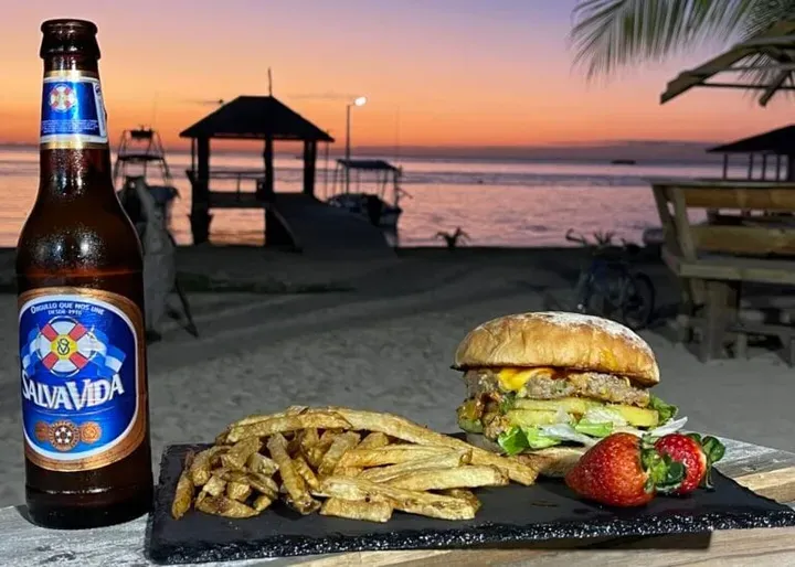 The Sea Hunt Divers beachfront in West End, Roatán at sunset